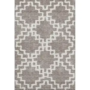 Photo of Taupe And Ivory Abstract Geometric Washable Area Rug With UV Protection