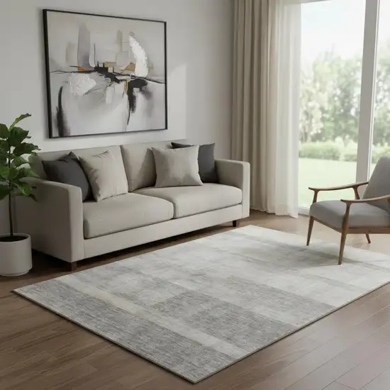 Taupe And Ivory Abstract Washable Area Rug With UV Protection Photo 1