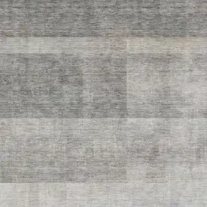 Photo of Taupe And Ivory Abstract Washable Area Rug With UV Protection