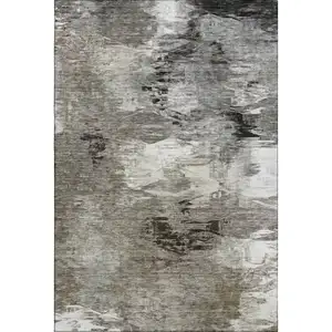 Photo of Taupe And Ivory Abstract Washable Area Rug With UV Protection