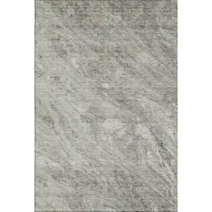 Photo of Taupe And Ivory Abstract Washable Area Rug With UV Protection