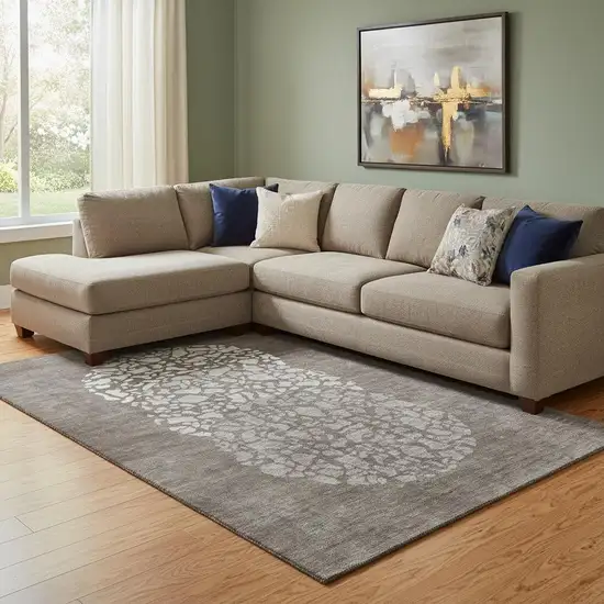 Taupe And Ivory Abstract Washable Area Rug With UV Protection Photo 1