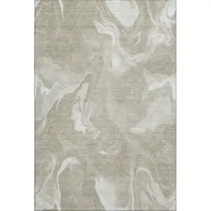 Photo of Taupe And Ivory Abstract Washable Area Rug With UV Protection