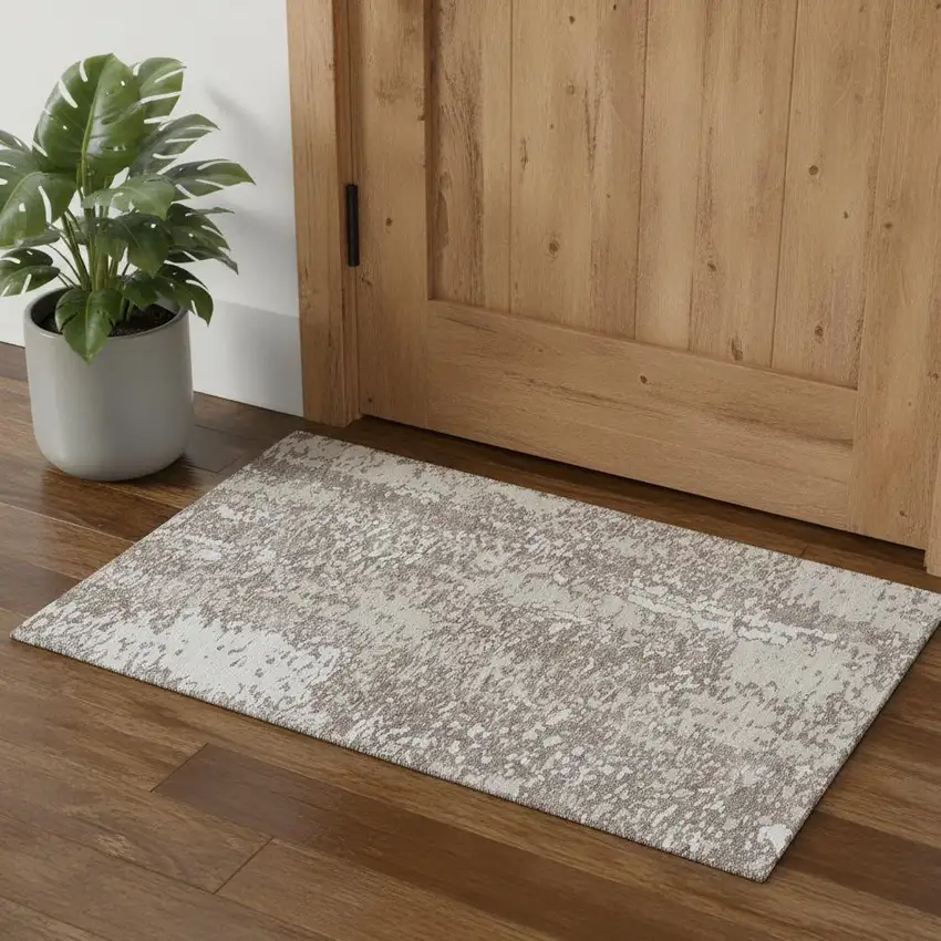 Taupe And Ivory Abstract Washable Area Rug With UV Protection Photo 1