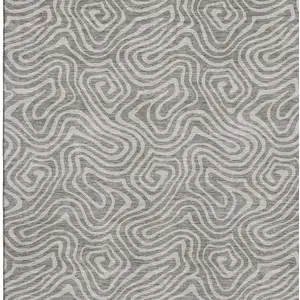 Photo of Taupe And Ivory Abstract Washable Area Rug With UV Protection
