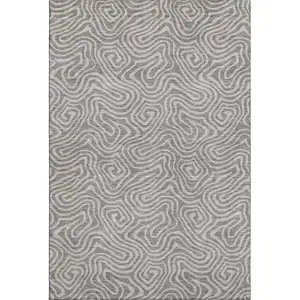 Photo of Taupe And Ivory Abstract Washable Area Rug With UV Protection
