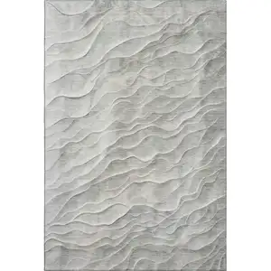 Photo of Taupe And Ivory Abstract Washable Area Rug With UV Protection
