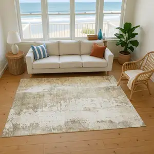 Photo of Taupe And Ivory Abstract Washable Area Rug With UV Protection