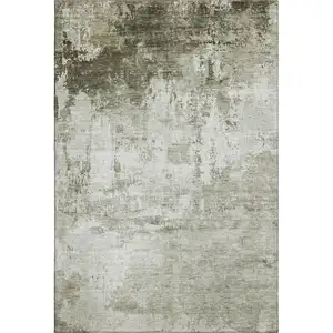 Photo of Taupe And Ivory Abstract Washable Area Rug With UV Protection