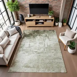 Photo of Taupe And Ivory Abstract Washable Area Rug With UV Protection