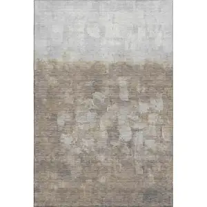 Photo of Taupe And Ivory Abstract Washable Area Rug With UV Protection
