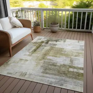 Photo of Taupe And Ivory Abstract Washable Indoor Outdoor Area Rug