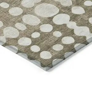 Photo of Taupe And Ivory Abstract Washable Indoor Outdoor Area Rug