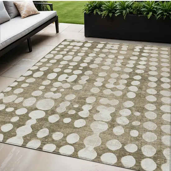 Taupe And Ivory Abstract Washable Indoor Outdoor Area Rug Photo 1