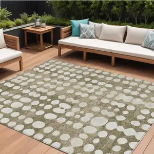 Photo of Taupe And Ivory Abstract Washable Indoor Outdoor Area Rug