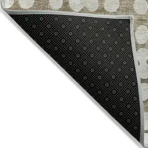Photo of Taupe And Ivory Abstract Washable Indoor Outdoor Area Rug