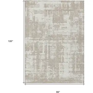 Photo of Taupe And Ivory Abstract Washable Indoor Outdoor Area Rug