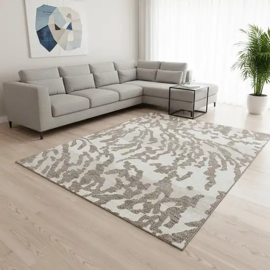 Taupe And Ivory Animal Print Washable Area Rug With UV Protection Photo 2