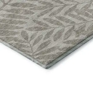 Photo of Taupe And Ivory Botanical Leaves Washable Area Rug With UV Protection