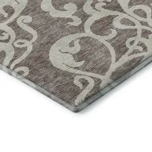 Photo of Taupe And Ivory Damask Washable Area Rug With UV Protection