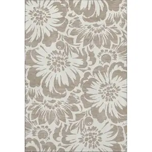 Photo of Taupe And Ivory Floral Washable Area Rug With UV Protection