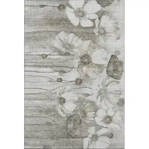 Photo of Taupe And Ivory Floral Washable Area Rug With UV Protection