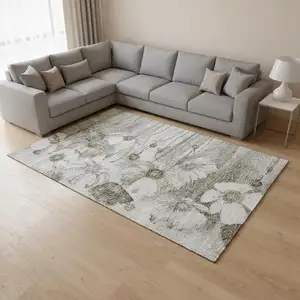 Photo of Taupe And Ivory Floral Washable Area Rug With UV Protection