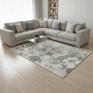 Photo of Taupe And Ivory Floral Washable Area Rug With UV Protection