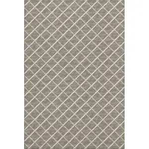 Photo of Taupe And Ivory Geometric Washable Area Rug With UV Protection