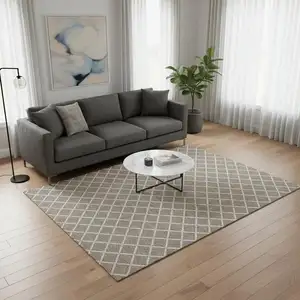 Photo of Taupe And Ivory Geometric Washable Area Rug With UV Protection