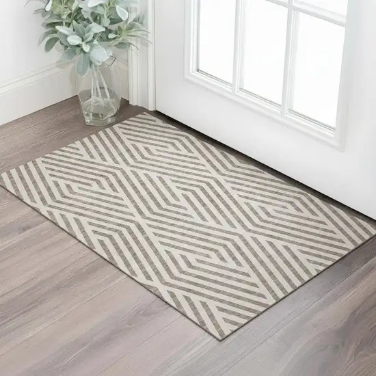 Taupe And Ivory Geometric Washable Area Rug With UV Protection Photo 1