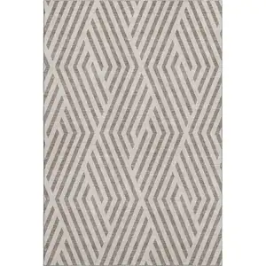 Photo of Taupe And Ivory Geometric Washable Area Rug With UV Protection