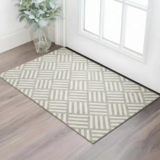 Taupe And Ivory Geometric Washable Area Rug With UV Protection Photo 1