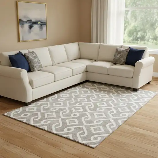 Taupe And Ivory Geometric Washable Area Rug With UV Protection Photo 1