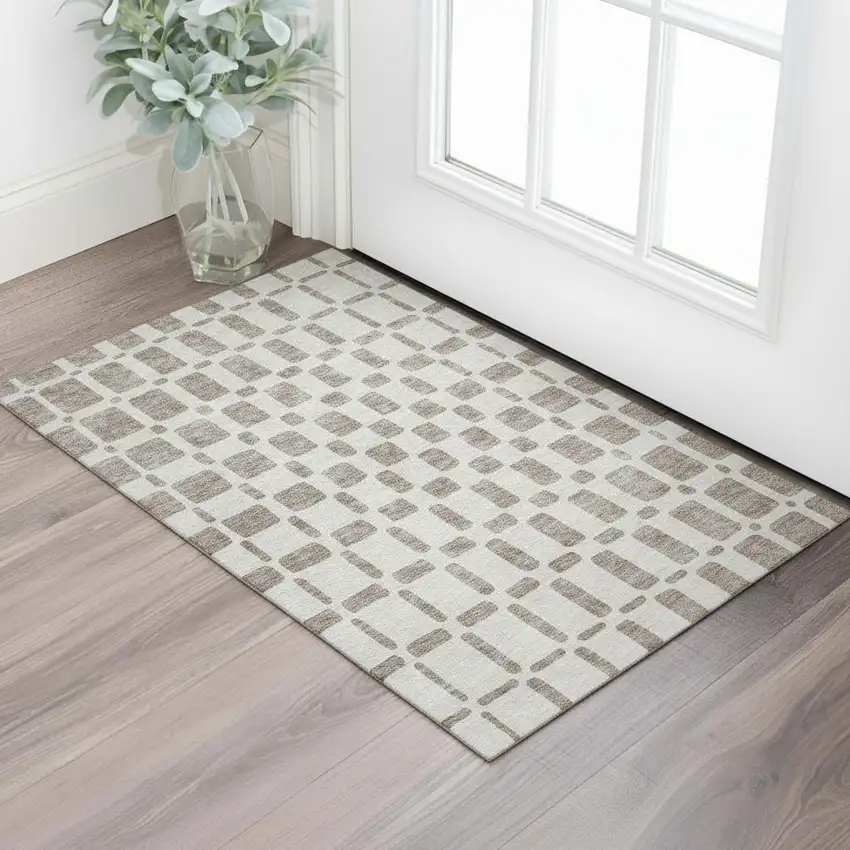 Taupe And Ivory Geometric Washable Area Rug With UV Protection Photo 1