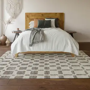 Photo of Taupe And Ivory Geometric Washable Area Rug With UV Protection