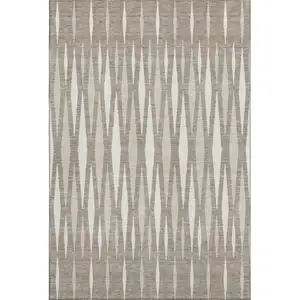 Photo of Taupe And Ivory Geometric Washable Area Rug With UV Protection