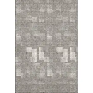 Photo of Taupe And Ivory Geometric Washable Area Rug With UV Protection