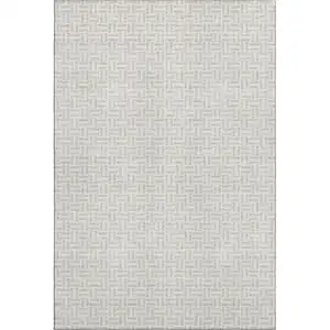 Photo of Taupe And Ivory Geometric Washable Area Rug With UV Protection