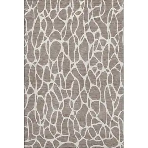 Photo of Taupe And Ivory Geometric Washable Area Rug With UV Protection