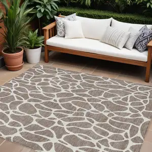 Photo of Taupe And Ivory Geometric Washable Indoor Outdoor Area Rug