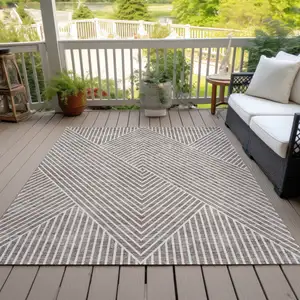 Photo of Taupe And Ivory Geometric Washable Indoor Outdoor Area Rug