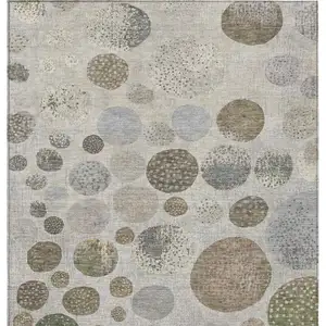 Photo of Taupe And Ivory Geometric Washable Indoor Outdoor Area Rug