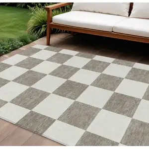 Photo of Taupe And Ivory Geometric Washable Indoor Outdoor Area Rug