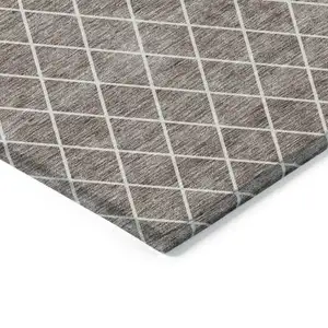 Photo of Taupe And Ivory Geometric Washable Indoor Outdoor Area Rug
