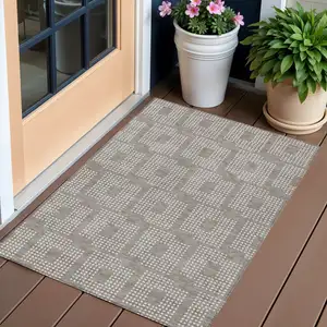Photo of Taupe And Ivory Geometric Washable Indoor Outdoor Area Rug