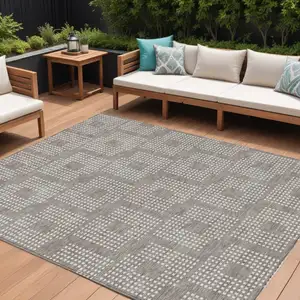 Photo of Taupe And Ivory Geometric Washable Indoor Outdoor Area Rug