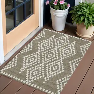 Photo of Taupe And Ivory Geometric Washable Indoor Outdoor Area Rug