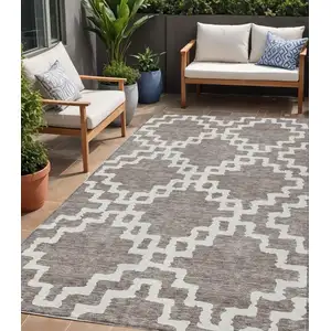 Photo of Taupe And Ivory Geometric Washable Indoor Outdoor Area Rug