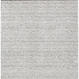 Photo of Taupe And Ivory Geometric Washable Indoor Outdoor Area Rug
